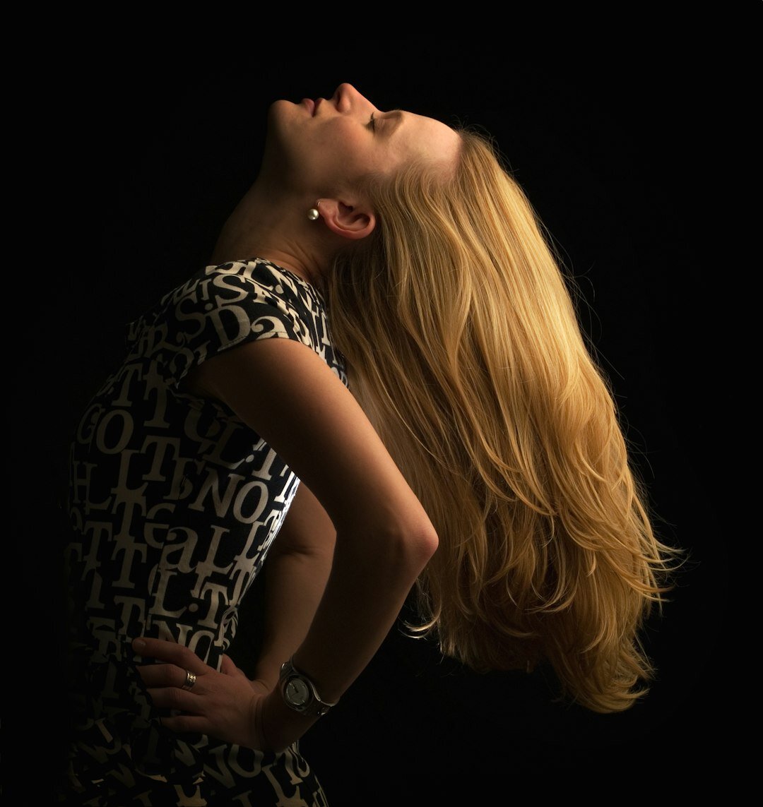 Studio portrait of a Belgian woman in her late twenties, logistics coordinator
