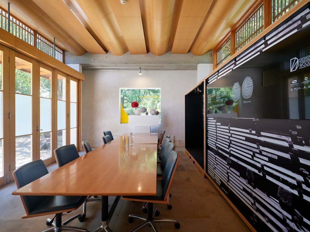 Group attending an interactive seminar in a modern meeting room